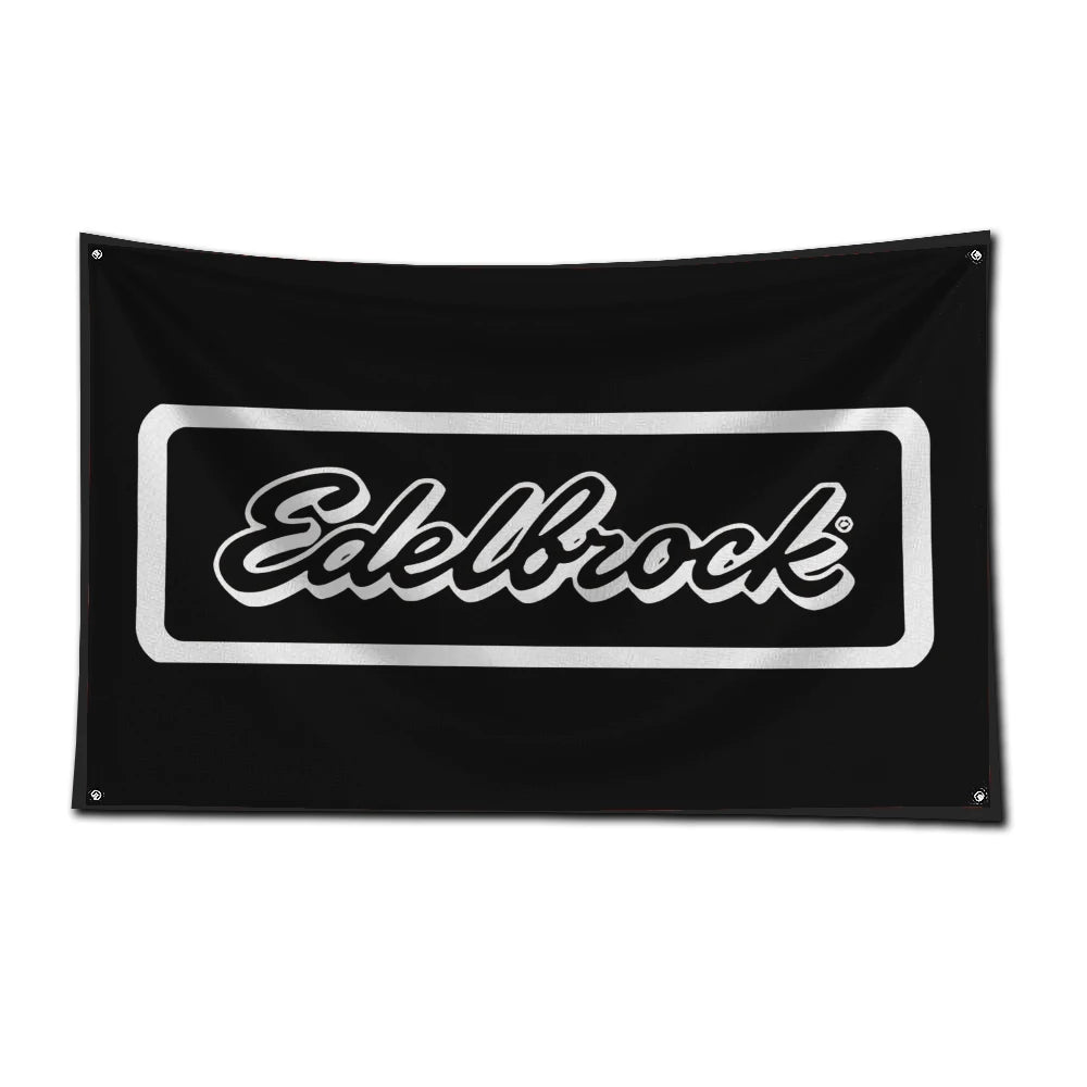 Black flag for a racing car garage featuring the Edelbrock logo in silver text.