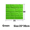 Green self-adhesive 3D foam wall panels measuring 35 by 30 centimeters