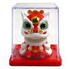 A solar-powered waving lucky cat figurine with white fur, red accents, and gold details displayed in a clear box.