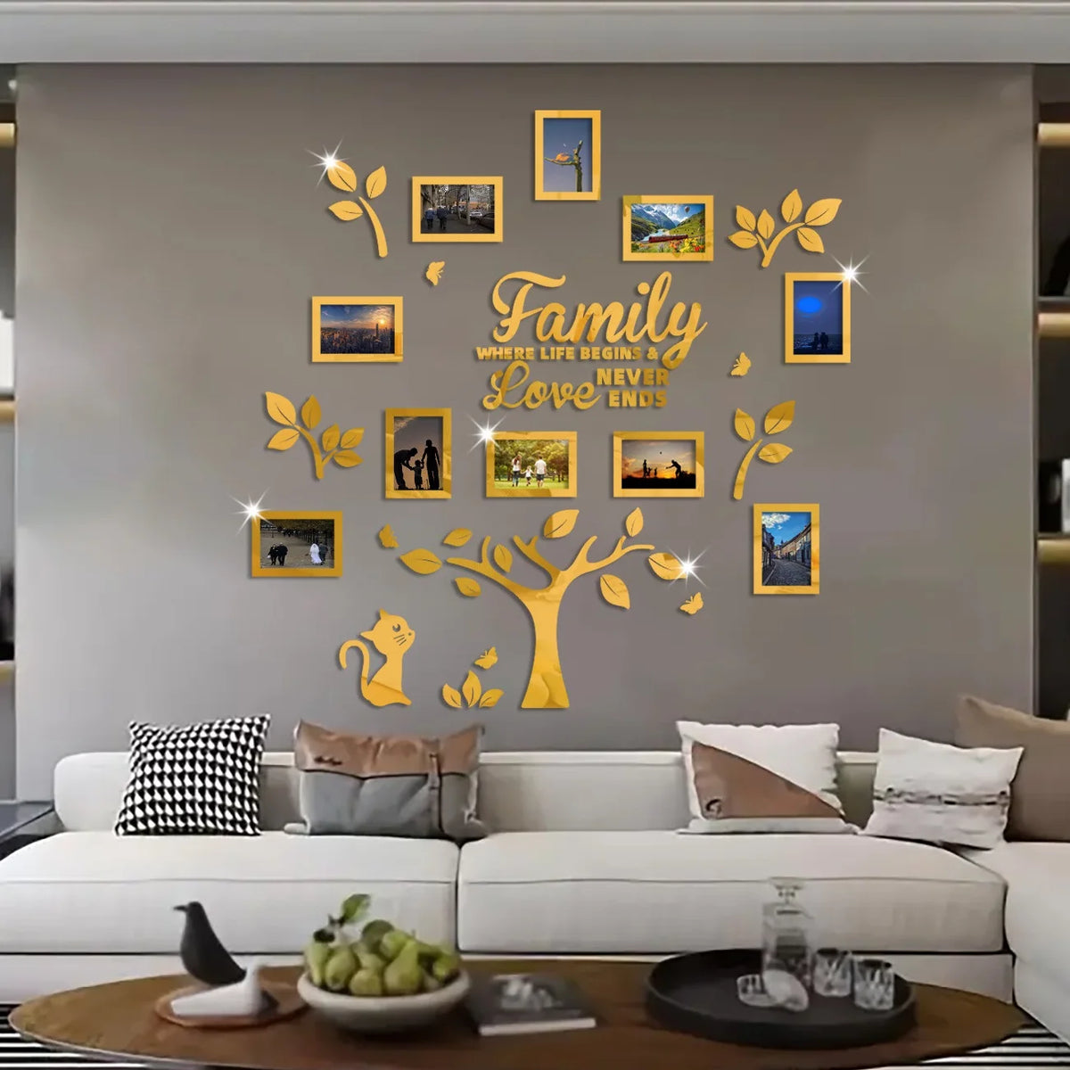 A wall collage featuring a golden family tree design made of framed photos on a gray wall.