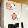 A set of cute panda fridge magnets featuring two pandas, one holding a small pink item.