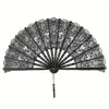 Black intricate hollowout lace handheld fan with a radiating design