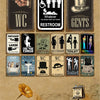 A collection of vintage metal signs featuring humorous and classic bathroom themes like WC, gents, ladies, and toilet.