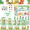 A collection of dinosaur birthday party supplies including balloons, banners, and cake toppers.
