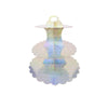 A three-tier rainbow cupcake stand with iridescent, holographic finish.