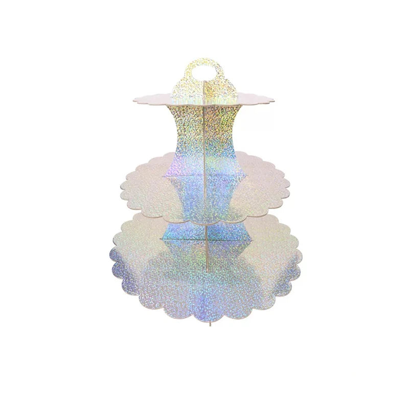 A three-tier rainbow cupcake stand with iridescent, holographic finish.