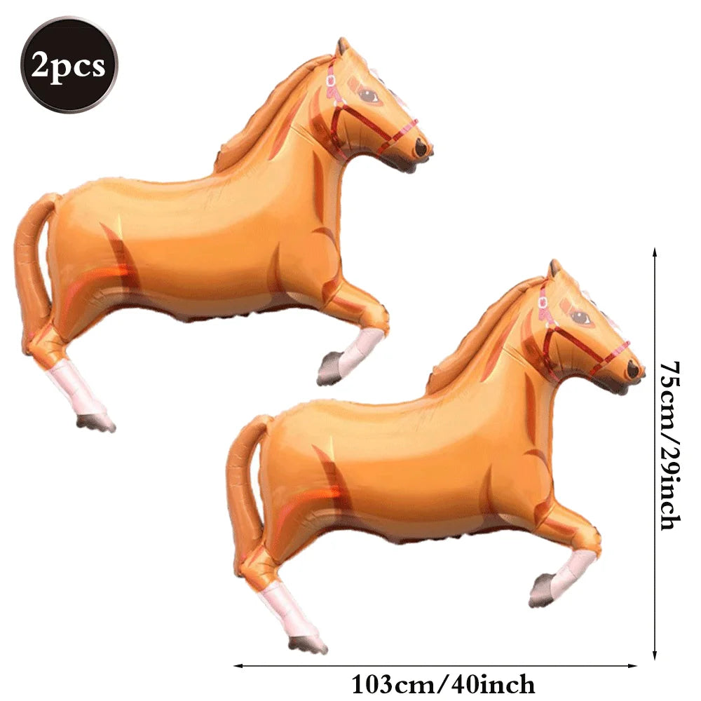 Two orange foil horse number balloons, one standing and one lying down.