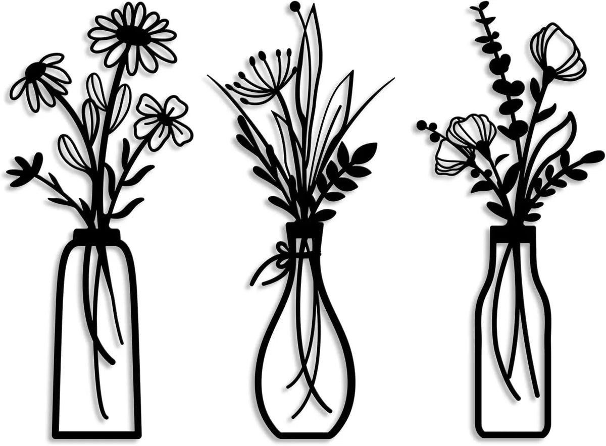 Set of three rustic metal silhouette flower arrangements in glass vases