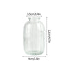 A clear glass vase with vertical ridges, measuring 3.5cm wide and 12cm tall.