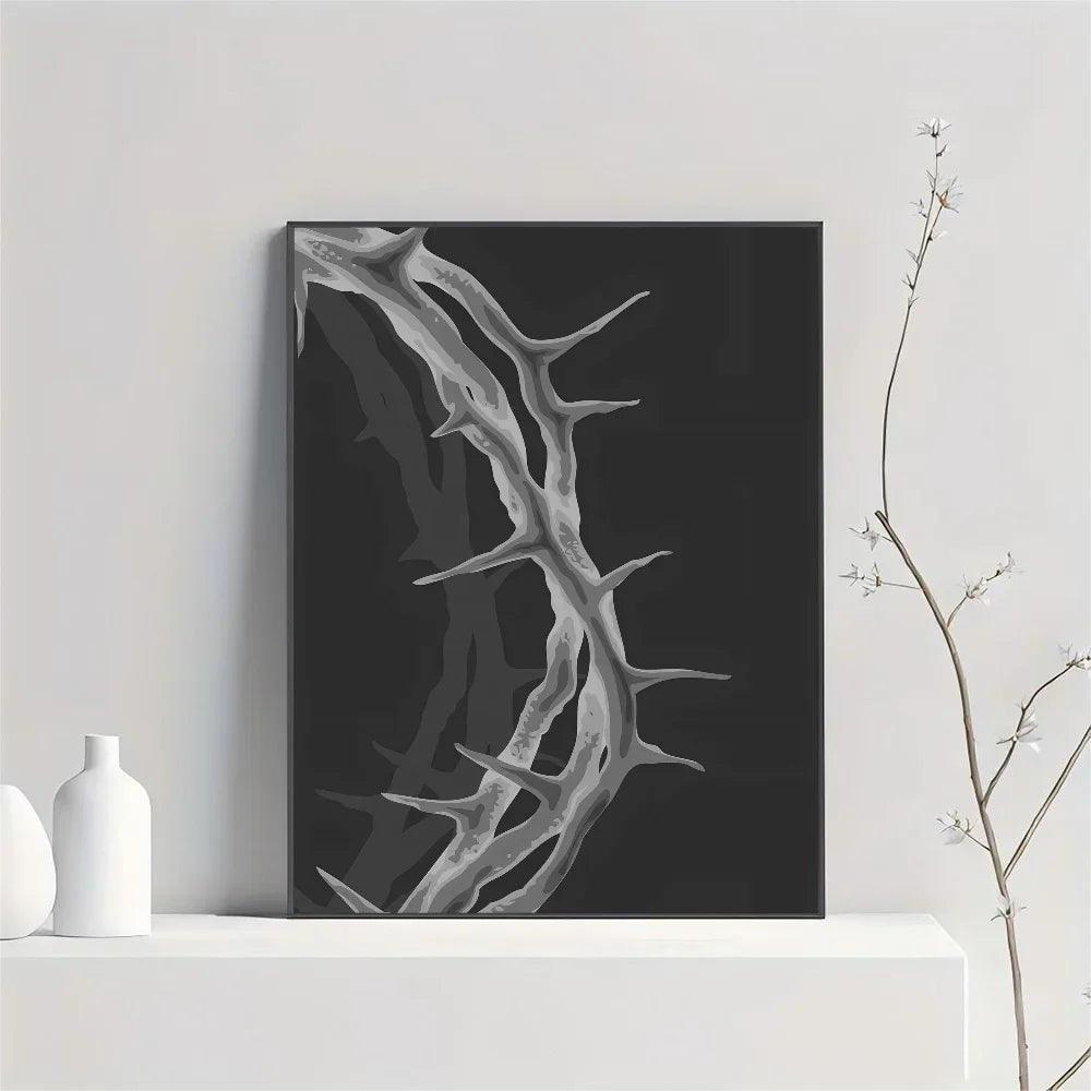 Abstract canvas wall art featuring a stylized depiction of the Son of God cross in gray on a black background.
