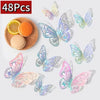 A set of 48 3D hollow butterfly wall stickers in gold and silver metallic decor.