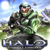 Halo Combat Evolved artwork featuring a Spartan soldier in green armor firing a weapon against a bright sky backdrop.