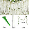 White silk wisteria hanging vine garland featuring long cascading flowers and green leaves