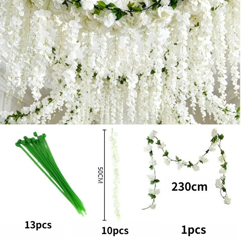 White silk wisteria hanging vine garland featuring long cascading flowers and green leaves