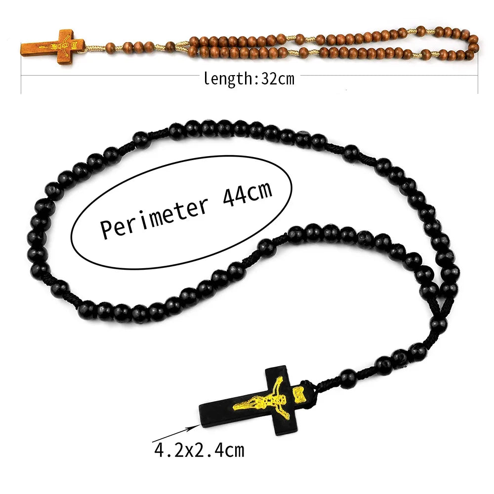 A brown wooden rosary beads necklace with a gold crucifix, measuring 32cm in length and a perimeter of 44cm.