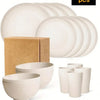 A set of 16 white ceramic plates and bowls, including dinner plates, salad plates, and small bowls.