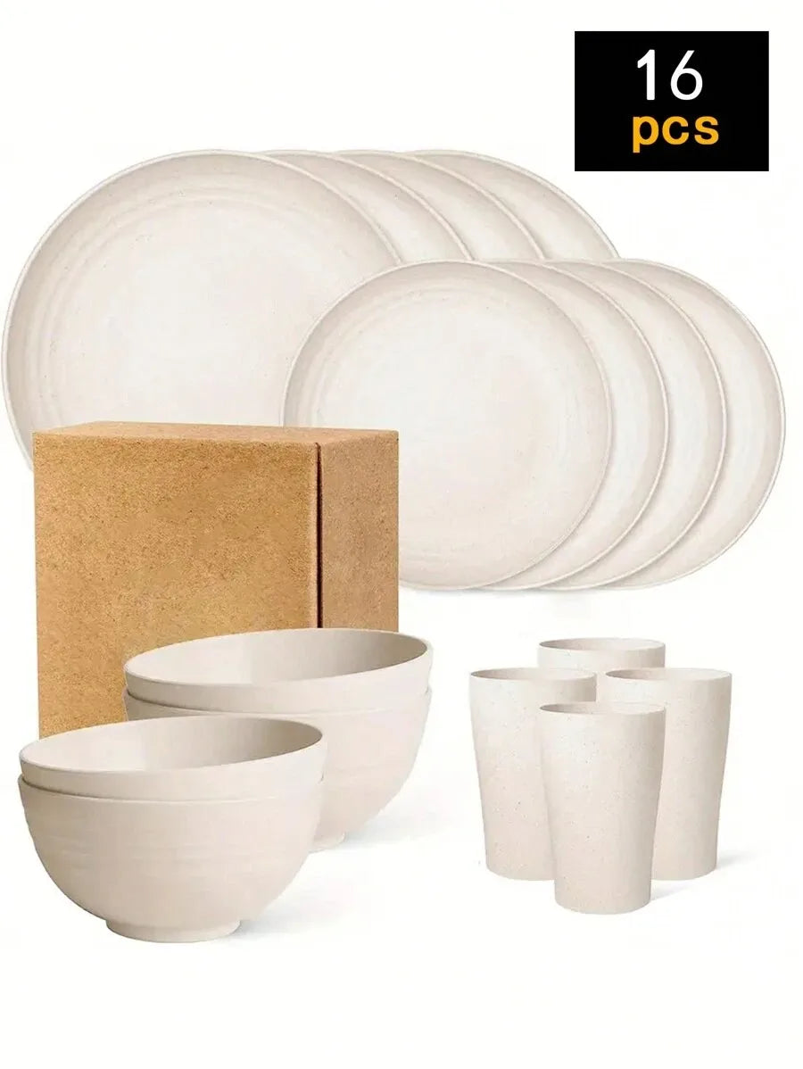 A set of 16 white ceramic plates and bowls, including dinner plates, salad plates, and small bowls.