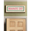 A framed canvas print with the text Dramatic Exit in pink lettering on a green background with a striped border.