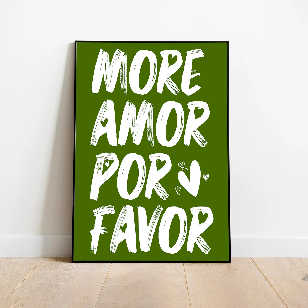 A vertical canvas print featuring white text on a dark green background that reads More Amor Por Favor