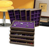 Un ensemble de boîtes de rangement pour bijoux en bois de noyer foncé avec doublure de velours violet, à côté d'une lampe jau