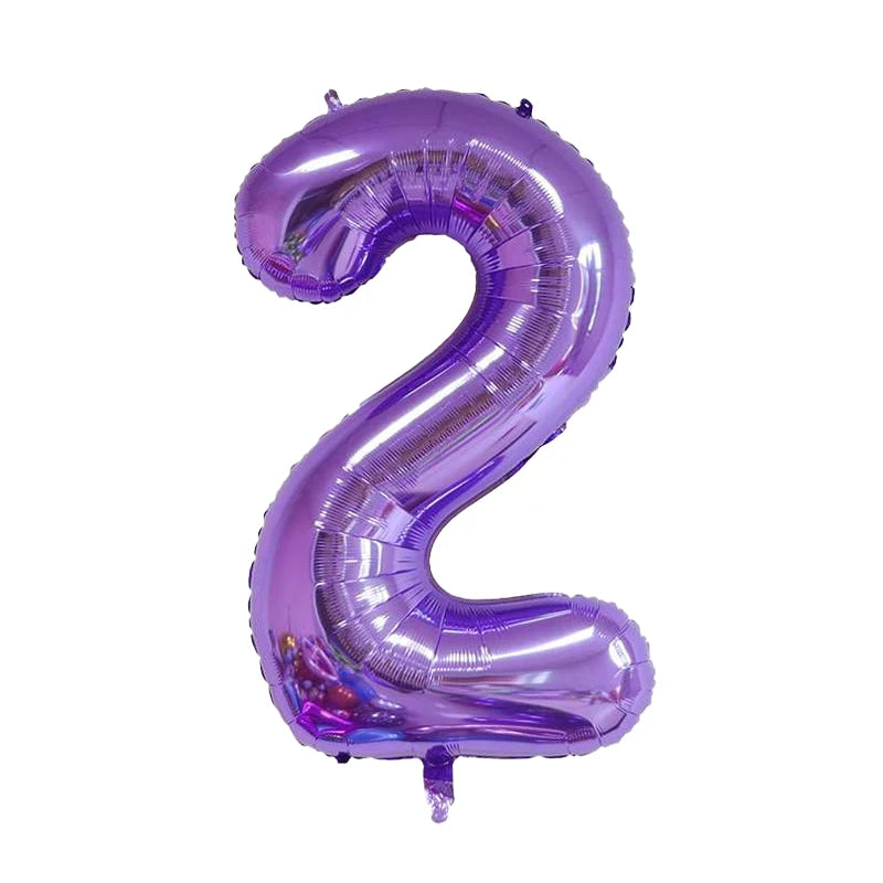 A purple foil number balloon shaped like the number 2.