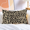 A decorative pillow cover featuring a brown and black leopard print on a white background.