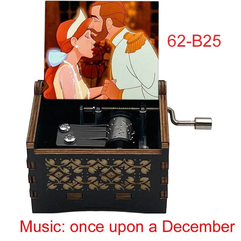 A hand-cranked wooden music box featuring an illustration of a couple, with the title Music: once upon a December.