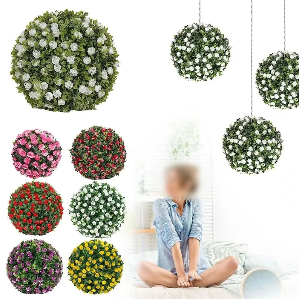 A collection of artificial rose ball decorative floral spheres in various shades of green and pink are displayed.