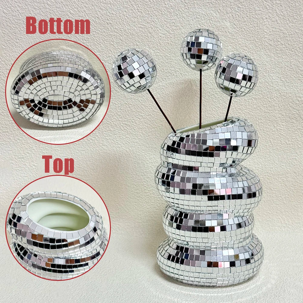 A stack of silver mirror tile disco balls, shown with close-ups of the bottom and top views.