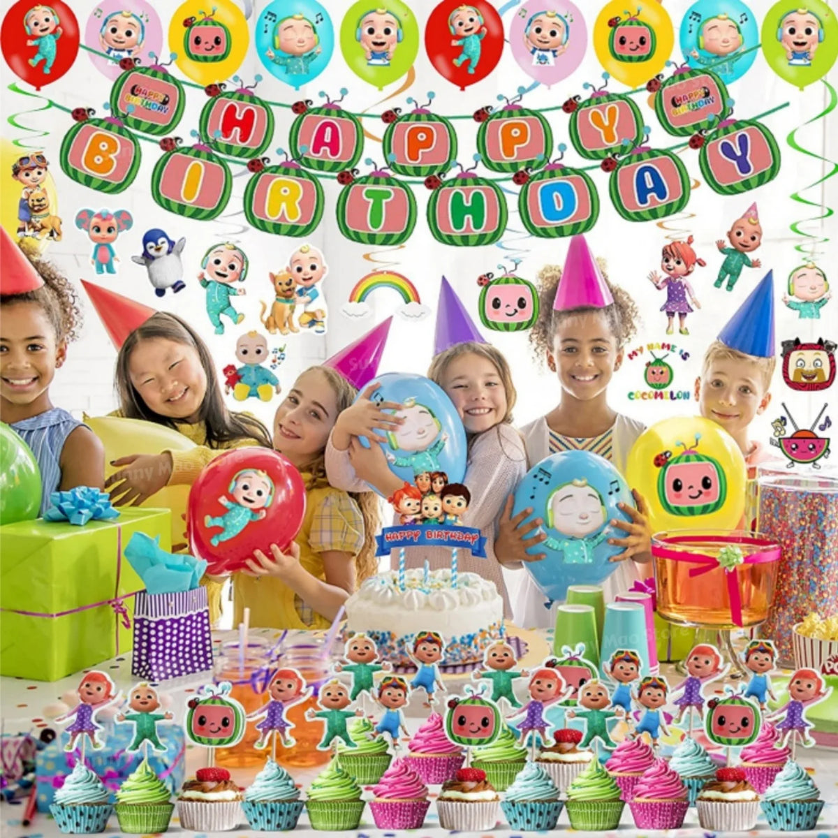 A colorful party supplies kit featuring balloons, cake, and tableware for a birthday celebration.
