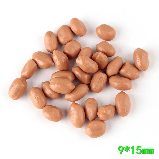 A pile of light brown resin fake corn miniatures for crafting and décor, measuring 9x15mm.