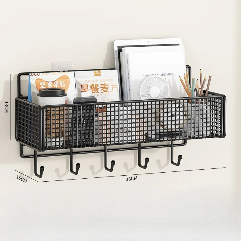 Black wire wall mounted storage basket for books and pencils, designed for bunk beds or dorm rooms.