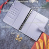 A premium purple A5 ring binder with pen loops and pockets shown open on a gray surface.