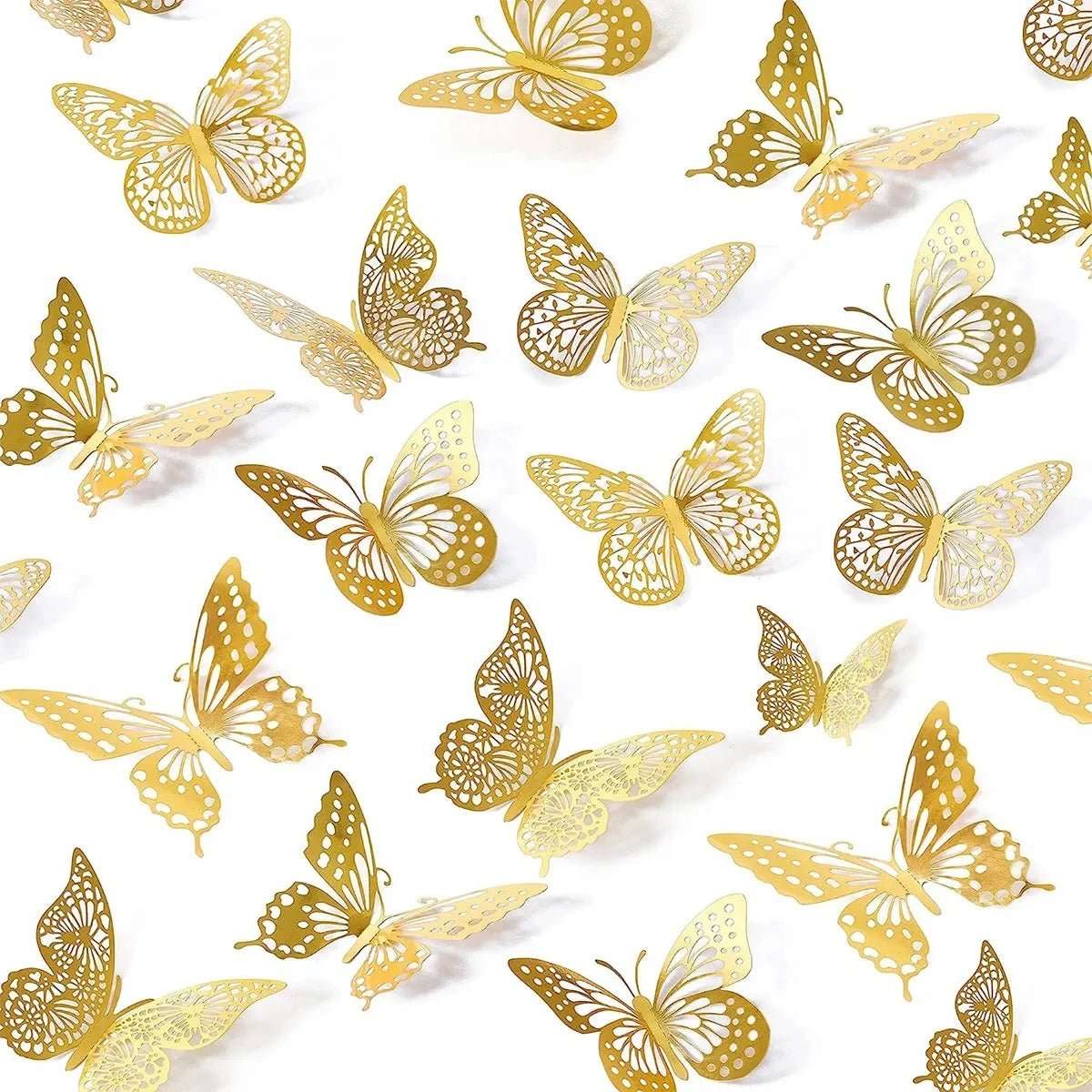 A set of three-dimensional gold butterfly wall decor pieces on a white background.