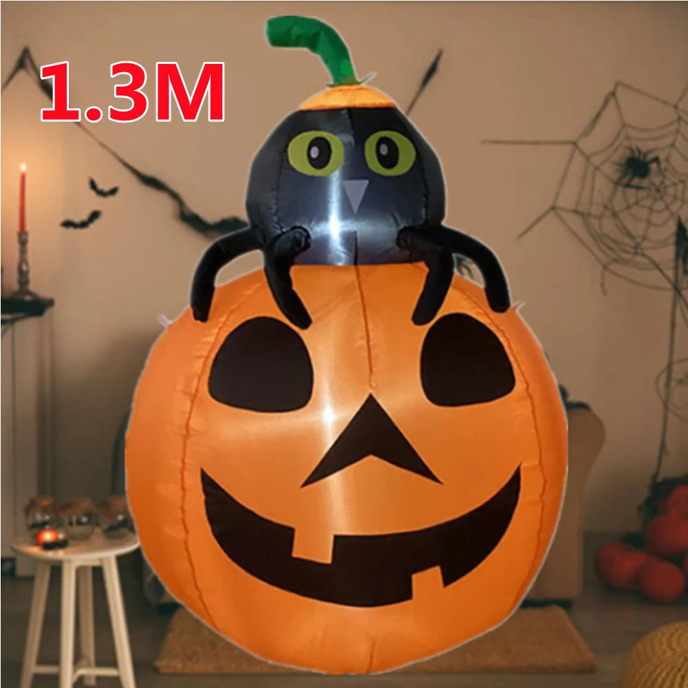 An inflatable Halloween pumpkin decoration with a black owl face and built-in LED lights.