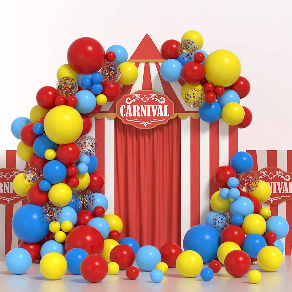 A colorful balloon garland arch kit featuring red, yellow, and blue balloons with star foil accents.