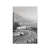 Black and white photo of a vintage Formula Grand Prix racing event on a racetrack with hills in the background.