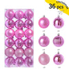 A set of 36 pink and purple festive Christmas baubles for holiday tree and decor.
