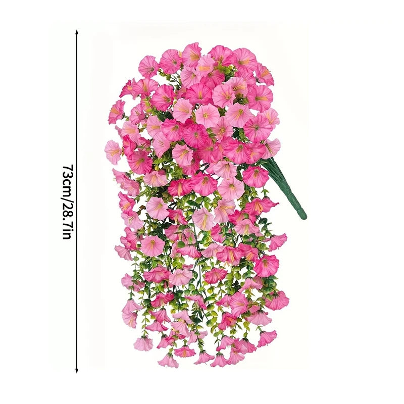 A vertical display of pink silk morning glory vine hanging flowers with green stems.