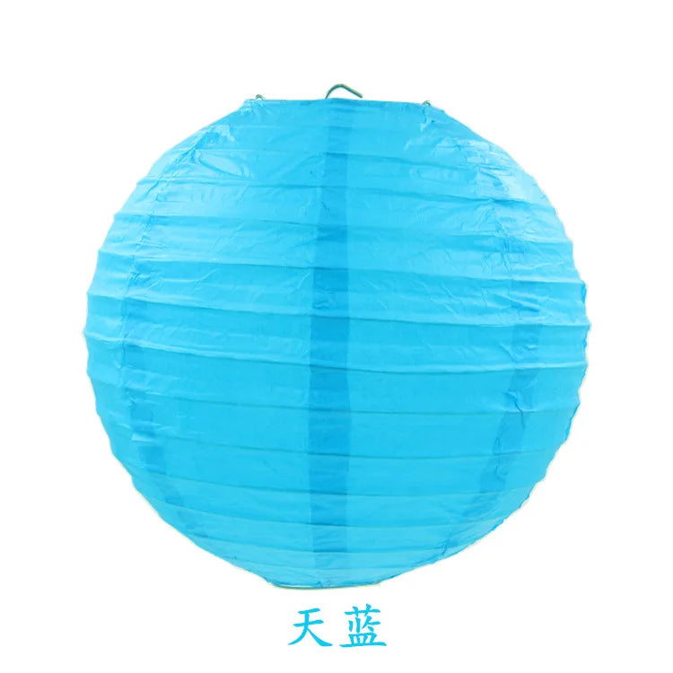 A light blue round paper lantern used for parties and weddings.