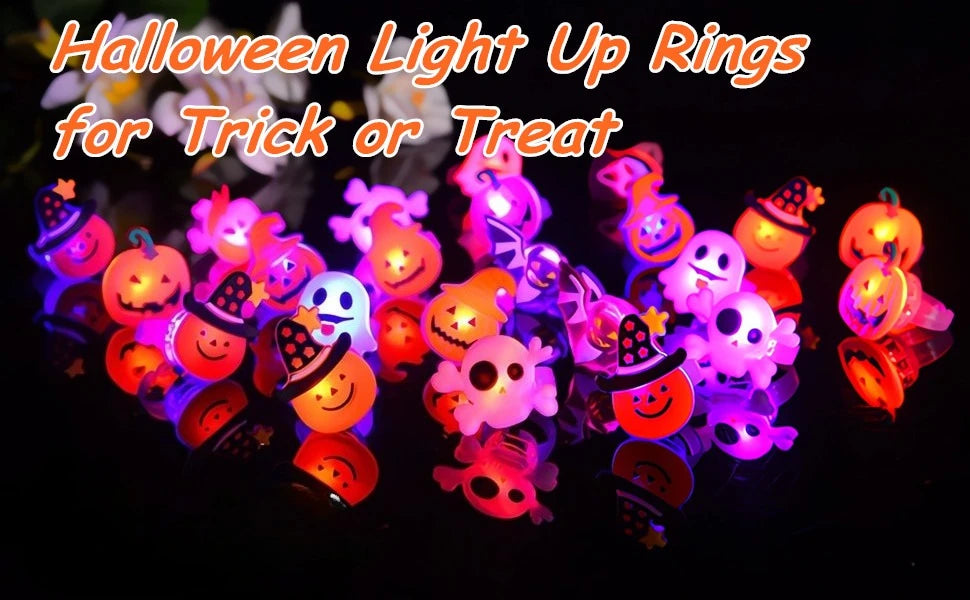 A collection of Halloween LED glow rings featuring pumpkin, ghost, and spider designs.