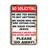 A vintage metal tin sign with distressed paint and bold red text that reads NO SOLICITING and other humorous messages.