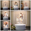 A collection of 3D LED night lights depicting religious figures, including Jesus Christ and the Crucifixion.