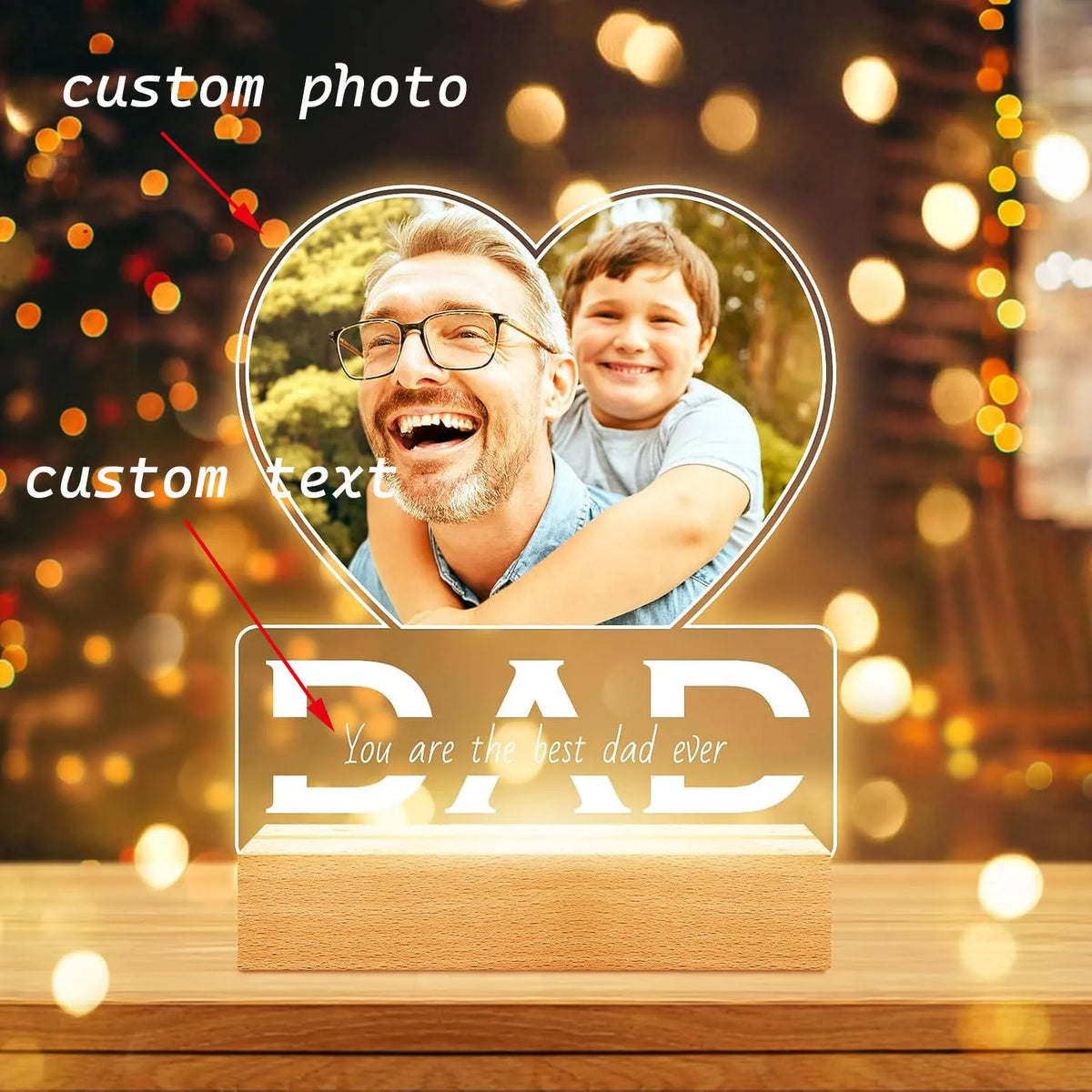 A personalized acrylic photo frame featuring a father and son, with custom text engraved on the base.