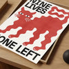 A canvas print featuring a red silhouette of a cat with text that reads Nine Lives and One Left.
