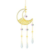 Gold moon suncatcher wind chime with prism accents hanging from a chain