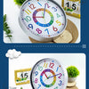 A colorful silent wall clock with numbers 1 to 12 and a second hand, displayed on a wooden surface.
