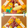 A hand holds an orange and yellow cartoon keychain pendant featuring Garfield and another character.