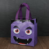 Purple Halloween party treat bags featuring a menacing pumpkin and ghost face design.