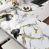 Marble white and gold kitchen countertop featuring marble patterns and gold accents